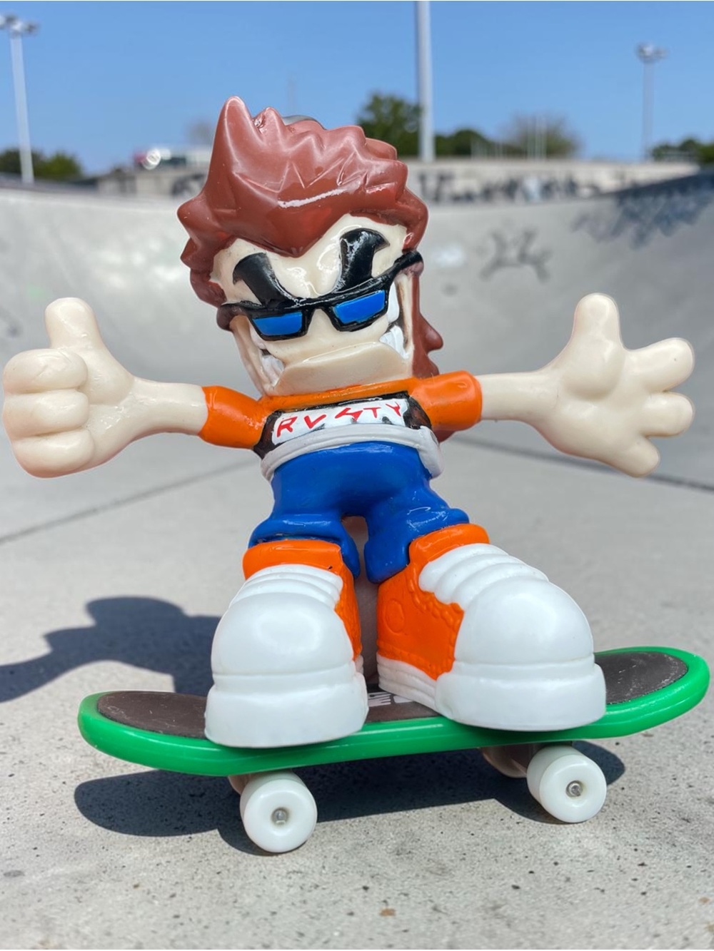 Vintage Tech Deck Dude Figurine Rusty #28 ( orange shirt surf and skate ) 2004